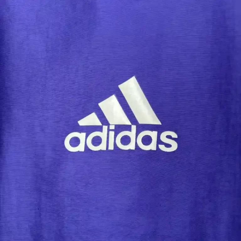 Chubasquero Real Madrid Morada 2023-24