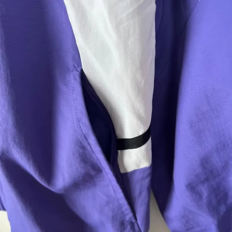 Chubasquero Real Madrid Morada 2023-24
