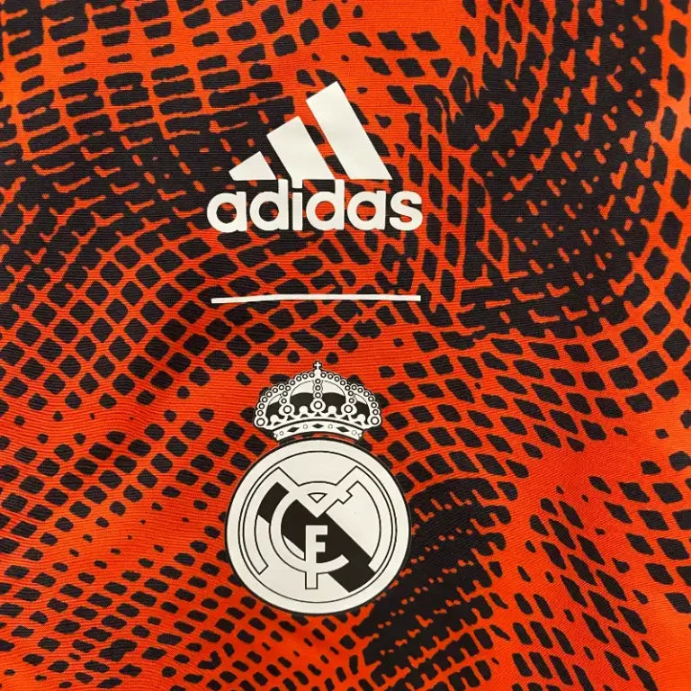 Chubasquero Real Madrid Fuego 2024-25