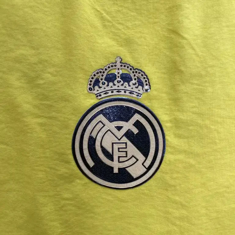Chubasquero Real Madrid Amarillo 2024-25