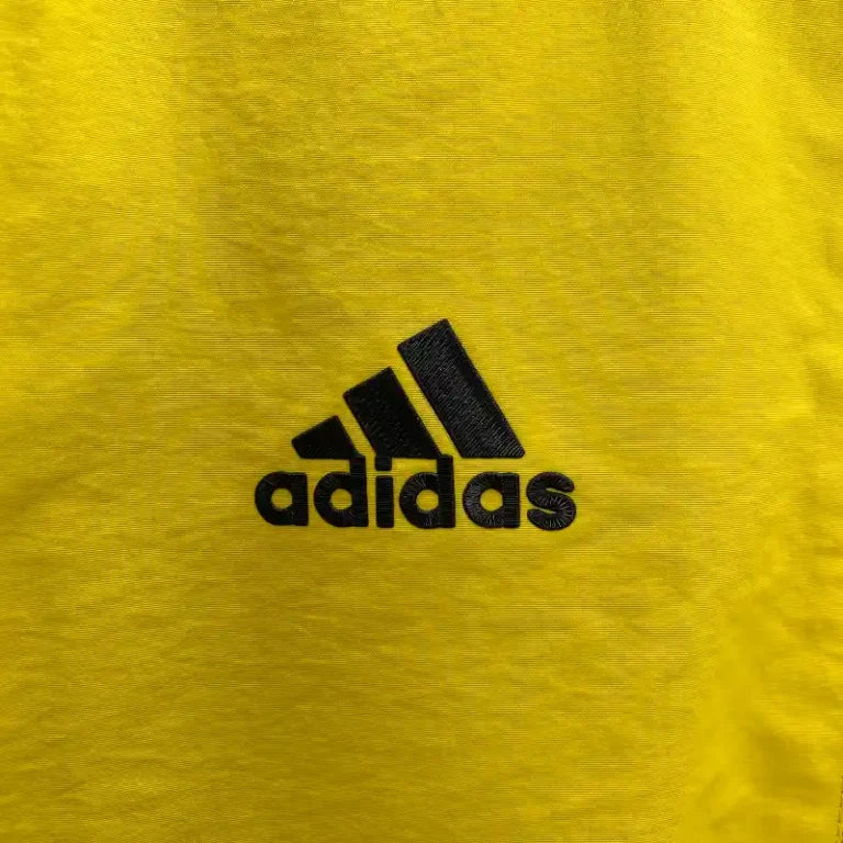 Chubasquero Real Madrid Amarillo 2024-25